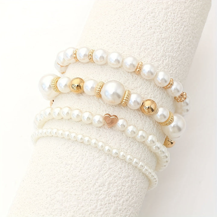Set Bracciali Cuore & Perle