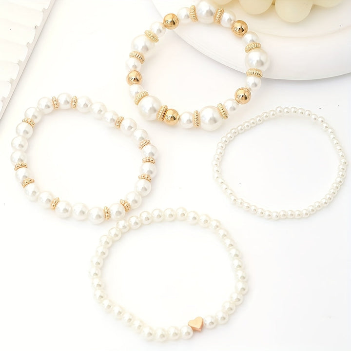 Set Bracciali Cuore & Perle